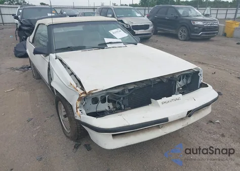 1987 Pontiac Sunbird Se from USA, damaged, VIN 1G2JD31K1H7575709